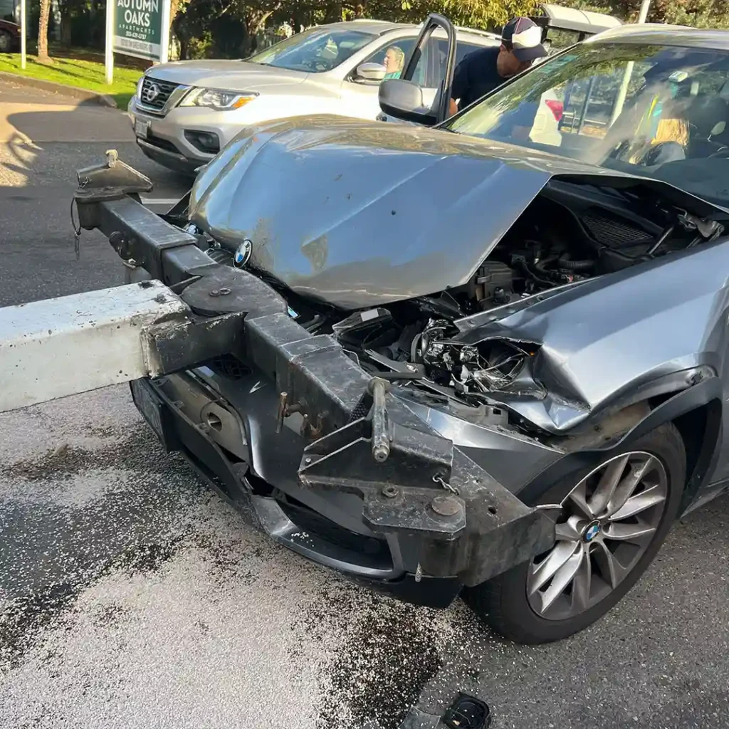 Mian Towing LLC accident recovery towing damaged vehicle in